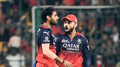 Bhuvneshwar Kumar gave RCB some early hope by dismissing GT captain Shubman Gill in the fifth over. (ANI) Bhuvneshwar Kumar gave RCB some early hope by dismissing GT captain Shubman Gill in the fifth over. (ANI)