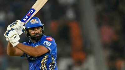 Mumbai Indians' Rohit Sharma plays a shot during the Indian Premier League (IPL) Twenty20 cricket match between Gujarat Titans and Mumbai Indians (AFP)