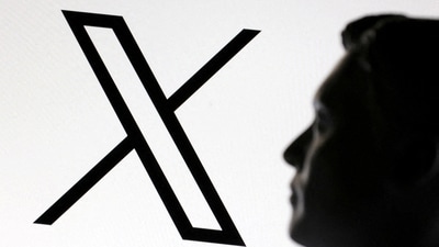 A 3D-printed miniature model of Elon Musk and the X logo are seen in this illustration taken January 23, 2025. (Reuters)