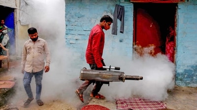 A sanitation worker fumigates a residential area as part of an initiative to curb breeding sites for mosquitoes causing dengue. (Representative image) (PTI file) A sanitation worker fumigates a residential area as part of an initiative to curb breeding sites for mosquitoes causing dengue. (Representative image) (PTI file)