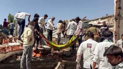 Rescuers at the scene of the fire on Tuesday. (ANI) Rescuers at the scene of the fire on Tuesday. (ANI)