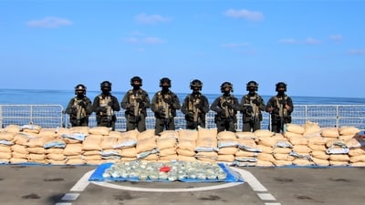 A specialist boarding team and Marine Commandos boarded the suspect vessel and conducted a thorough search, revealing various sealed packets. (Yogesh Naik/HT)