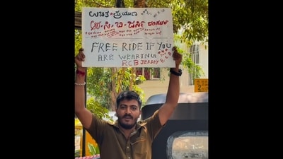 Azzu Sultan, a city-based auto driver, has become an internet sensation for his heartwarming act of offering free rides to passengers wearing RCB jerseys. (Instagram/autokannadiga0779)