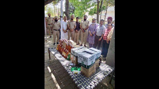 A cache of illicit liquor recovered by the excise department in Ludhiana on Wednesday. (HT Photo)