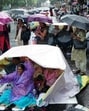 Accredited Social Health Activist (ASHA) workers block a road during a protest for hike in their honorarium amid rains rain, in Thiruvananthapuram. (PTI) Accredited Social Health Activist (ASHA) workers block a road during a protest for hike in their honorarium amid rains rain, in Thiruvananthapuram. (PTI)
