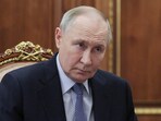 Russian President Vladimir Putin meets with Head of the Republic of Buryatia Alexei Tsydenov at the Kremlin in Moscow, Russia, Wednesday, April 2, 2025.