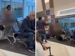 A woman started taking off her clothes while waiting at an airport. 