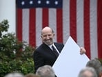 US Secretary of Commerce Howard Lutnick holds a chart as unseen US President Donald Trump delivers remarks on reciprocal tariffs during an event in the Rose Garden entitled "Make America Wealthy Again" at the White House in Washington, DC, on April 2, 2025. Trump geared up to unveil sweeping new "Liberation Day" tariffs in a move that threatens to ignite a devastating global trade war. Key US trading partners including the European Union and Britain said they were preparing their responses to Trump's escalation, as nervous markets fell in Europe and America. (Photo by Brendan SMIALOWSKI / AFP)