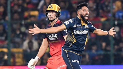 Gujarat Titans' Mohammed Siraj celebrates the wicket of Royal Challengers Bengaluru's Philip Salt (Surjeet Yadav)
