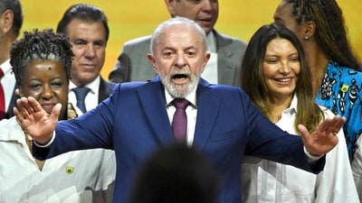 Brazil's President Luiz Inacio Lula da Silva (C) gestures next to his wife Janja Lula da Silva (R) during an event to highlight accomplishments in the first two years in office in Brasilia on April 3, 2025. Brazil's President Luiz Inacio Lula da Silva said Thursday his country would take "all appropriate measures to defend" itself against import tariffs imposed by US counterpart Donald Trump. (Photo by EVARISTO SA / AFP) (AFP) Brazil's President Luiz Inacio Lula da Silva (C) gestures next to his wife Janja Lula da Silva (R) during an event to highlight accomplishments in the first two years in office in Brasilia on April 3, 2025. Brazil's President Luiz Inacio Lula da Silva said Thursday his country would take "all appropriate measures to defend" itself against import tariffs imposed by US counterpart Donald Trump. (Photo by EVARISTO SA / AFP) (AFP)