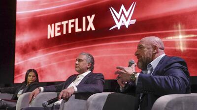 From left, Netflix Chief Content Officer Bela Bajaria, WWE President Nick Khan and WWE Chief Content Officer Paul "Triple H" Levesque discuss the World Wrestling Entertainment and Netflix during an event at Netflix's headquarters in Los Angeles on Dec. 3, 2024. (Meg Oliphant/WWE/Netflix via AP) (AP) From left, Netflix Chief Content Officer Bela Bajaria, WWE President Nick Khan and WWE Chief Content Officer Paul "Triple H" Levesque discuss the World Wrestling Entertainment and Netflix during an event at Netflix's headquarters in Los Angeles on Dec. 3, 2024. (Meg Oliphant/WWE/Netflix via AP) (AP)