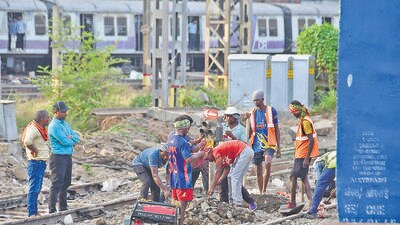 Mumbai, India – May 30, 2024: Workers busy in work were Central Railway CSMT main line platform numbers 9 and 10 going to extend length, onwards 36th hour's long Mega Block held by Central Railway during the extension work, several mail-express and suburban trains will be short-terminated and short-originated by CR at CSMT, in Mumbai, India, on Thursday, May 30, 2024. (Photo by Bhushan Koyande/HT Photo) Mumbai, India – May 30, 2024: Workers busy in work were Central Railway CSMT main line platform numbers 9 and 10 going to extend length, onwards 36th hour's long Mega Block held by Central Railway during the extension work, several mail-express and suburban trains will be short-terminated and short-originated by CR at CSMT, in Mumbai, India, on Thursday, May 30, 2024. (Photo by Bhushan Koyande/HT Photo)