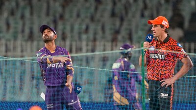 SRH captain Pat Cummins with his KKR counterpart Ajinkya Rahane during the toss. (PTI) SRH captain Pat Cummins with his KKR counterpart Ajinkya Rahane during the toss. (PTI)