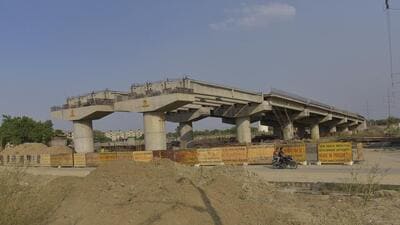 The overbridge spans 751 metres over the Ghaziabad-Meerut railway section. The Railways is responsible for constructing 40 metres of the structure above the tracks, while the bridge corporation is handling the rest. (Sakin Ali/HT Photo) The overbridge spans 751 metres over the Ghaziabad-Meerut railway section. The Railways is responsible for constructing 40 metres of the structure above the tracks, while the bridge corporation is handling the rest. (Sakin Ali/HT Photo)