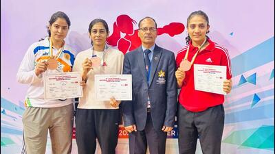 Three Rajasthan boxers -- Shweta (left), Sunita and Lalita (right) -- won medals at the Women’s National Championships. (HT Photo) Three Rajasthan boxers -- Shweta (left), Sunita and Lalita (right) -- won medals at the Women’s National Championships. (HT Photo)