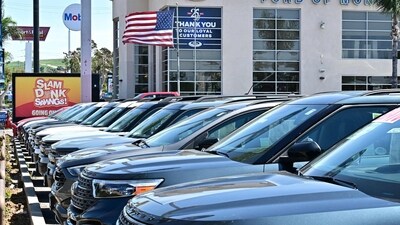 Vehicles seen on the lot of a Ford auto dealership in Montebello, California on April 1, 2025. (AFP)