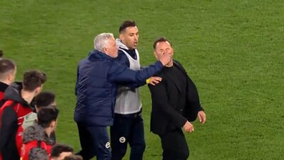 Jose Mourinho grabs Galatasary manager Okan Buruk's nose (X)