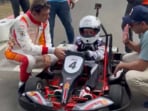 Ajith Kumar with his son Aadvik at a professional race track in Chennai.