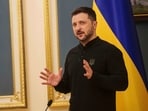 Ukrainian President Volodymyr Zelensky speaks during a press conference in Kyiv..