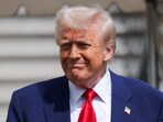 FILE PHOTO: U.S. President Donald Trump reacts before boarding Marine One, while departing the White House en route to Florida, in Washington, D.C., U.S., April 3, 2025. 