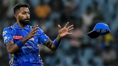 Hardik Pandya is being criticised online for his decision to retire Tilak Varma out in the 19th over (AFP)