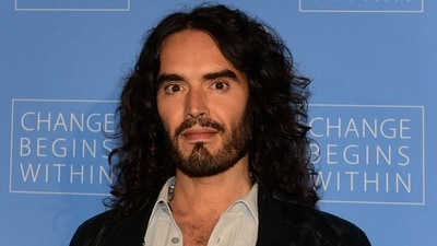 (FILES) Actor Russell Brand settled into a quieter life with his wife, Laura. After a decade-long romance, they married in 2017. (Photo by Frederic J. BROWN / AFP) (AFP) (FILES) Actor Russell Brand settled into a quieter life with his wife, Laura. After a decade-long romance, they married in 2017. (Photo by Frederic J. BROWN / AFP) (AFP)