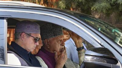Jammu and Kashmir chief minister Omar Abdullah and National Conference president Farooq Abdullah arriving for the meeting of ruling alliance MLAs in Srinagar on Friday. (PTI Photo) Jammu and Kashmir chief minister Omar Abdullah and National Conference president Farooq Abdullah arriving for the meeting of ruling alliance MLAs in Srinagar on Friday. (PTI Photo)
