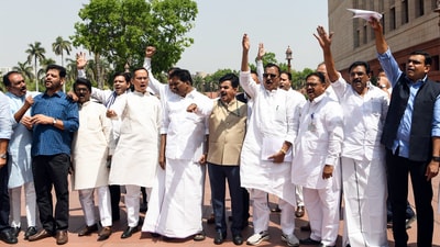 Deputy Leader of Congress in Lok Sabha Gaurav Gogoi and other opposition MPs hold a protest over the issue of US tariffs on India, in front of Makar Dwar of the Parliament during the budget session, at Parliament House in New Delhi on Friday. (ANI Photo/Rahul Singh) (ANI) Deputy Leader of Congress in Lok Sabha Gaurav Gogoi and other opposition MPs hold a protest over the issue of US tariffs on India, in front of Makar Dwar of the Parliament during the budget session, at Parliament House in New Delhi on Friday. (ANI Photo/Rahul Singh) (ANI)