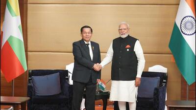 Prime Minister Narendra Modi meets Myanmar's junta chief Min Aung Hlaing in Bangkok on Friday (REUTERS)