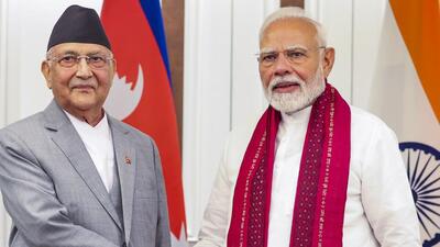 Prime Minister Narendra Modi with his Nepalese counterpart KP Sharma Oli during a meeting, on the sidelines of the Bimstec Summit (PMO/via PTI)
