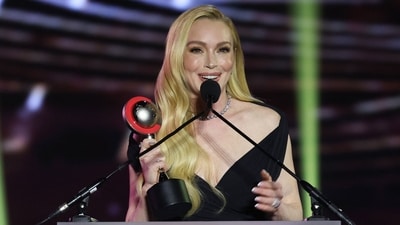 US actress Lindsay Lohan holds her CinemaCon Vanguard Award as she speaks on stage during the CinemaCon 2025 Big Screen Achievement Awards at Omnia Nightclub at Caesars Palace in Las Vegas, Nevada on April 3, 2025. (Photo by VALERIE MACON / AFP) (AFP) US actress Lindsay Lohan holds her CinemaCon Vanguard Award as she speaks on stage during the CinemaCon 2025 Big Screen Achievement Awards at Omnia Nightclub at Caesars Palace in Las Vegas, Nevada on April 3, 2025. (Photo by VALERIE MACON / AFP) (AFP)