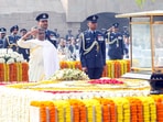 President Draupadi Murmu pays homage to Mahatma Gandhi on his death anniversary, at Rajghat in New Delhi.