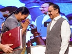 Union health minister JP Nadda, Union minister of state for health Anupriya Patel and Delhi chief minister Rekha Gupta with others during the MoU signing ceremony between National Health Authority and Government of Delhi for the rollout of Ayushman Bharat Pradhan Mantri Jan Arogya Yojana (AB PM-JAY) in New Delhi on Saturday, 