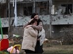 People react at the site of a deadly Russian missile strike on a residential area where multiple children and adults were killed, amid Russia's attack on Ukraine. People react at the site of a deadly Russian missile strike on a residential area where multiple children and adults were killed, amid Russia's attack on Ukraine.
