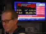 A trader works on the floor of the New York Stock Exchange April 4, 2025, in New York. Wall Street stocks suffered another bruising sell-off April 4, as major indices slumped more than five per cent following President Donald Trump's aggressive tariff policies. 