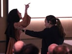 CORRECTS DATE - A pro-Palestinian demonstrator, Ibtihal Aboussad, is escorted away by security as they interrupt Microsoft AI CEO Mustafa Suleyman during a presentation of the company's AI assistant, Copilot, ahead of a 50th Anniversary presentation at Microsoft headquarters, Friday, April 4, 2025, in Redmond, Wash. (AP Photo/Jason Redmond) CORRECTS DATE - A pro-Palestinian demonstrator, Ibtihal Aboussad, is escorted away by security as they interrupt Microsoft AI CEO Mustafa Suleyman during a presentation of the company's AI assistant, Copilot, ahead of a 50th Anniversary presentation at Microsoft headquarters, Friday, April 4, 2025, in Redmond, Wash. (AP Photo/Jason Redmond)