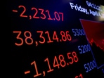 A screen shows the Dow Jones Industrial Average after the close of trading on the floor at the New York Stock Exchange (NYSE) after the closing bell in New York City, US, April 4.