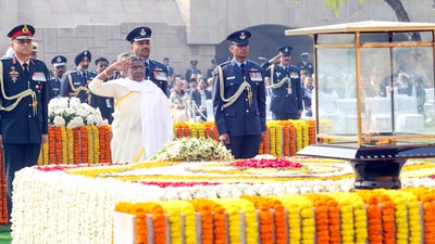President Draupadi Murmu pays homage to Mahatma Gandhi on his death anniversary, at Rajghat in New Delhi. (ANI File) President Draupadi Murmu pays homage to Mahatma Gandhi on his death anniversary, at Rajghat in New Delhi. (ANI File)