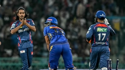 Mumbai Indians' Naman Dhir (2R) is clean bowled by Lucknow Super Giants' Digvesh Rathi (2L) (AFP) Mumbai Indians' Naman Dhir (2R) is clean bowled by Lucknow Super Giants' Digvesh Rathi (2L) (AFP)