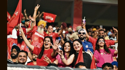 Fans in an ecstatic mood during the match. However, their bright smiles faded by the end of the night, with RR beating PBKS by 50 runs. (Ravi Kumar/HT) Fans in an ecstatic mood during the match. However, their bright smiles faded by the end of the night, with RR beating PBKS by 50 runs. (Ravi Kumar/HT)