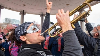 A band plays on Boston Common during the Hands Off Massachusetts! Rally/March in Boston, Massachusetts (AFP) A band plays on Boston Common during the Hands Off Massachusetts! Rally/March in Boston, Massachusetts (AFP)