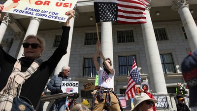 People participate in a protest at the Utah State Capitol  (REUTERS)