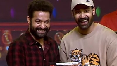 Jr NTR and Narne Nithiin posed for photos together when the former pinched the latter. Jr NTR and Narne Nithiin posed for photos together when the former pinched the latter.