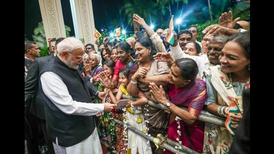 Prime Minister Narendra Modi receives a warm welcome from the Indian diaspora and members of the Indian community as he arrives at the hotel in Colombo, where he will stay during his Sri Lanka visit, on Friday. (ANI Photo)