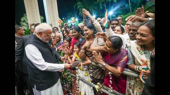 Prime Minister Narendra Modi receives a warm welcome from the Indian diaspora and members of the Indian community as he arrives at the hotel in Colombo, where he will stay during his Sri Lanka visit, on Friday. (ANI Photo)