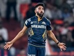 Gujarat Titans' Mohammed Siraj celebrates after taking the wicket of Sunrisers Hyderabad's Simarjeet Singh during the Indian Premier League (IPL) 