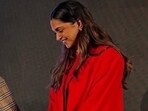 Deepika Padukone is proof that confidence is key to pulling off a red monochrome pantsuit. (Instagram/ Shaleena Nathani) Deepika Padukone is proof that confidence is key to pulling off a red monochrome pantsuit. (Instagram/ Shaleena Nathani)