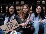 Columbia student demonstrators chain themselves to the gates of St. Paul’s Chapel at Columbia University to denounce the arrest of Mahmoud Khalil in New York City, U.S., April 2, 2025. 