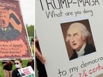 Hitler, George Washington spotted at anti-Trump 'Hands Off' protests (Photo by Amid FARAHI / AFP, REUTERS) Hitler, George Washington spotted at anti-Trump 'Hands Off' protests (Photo by Amid FARAHI / AFP, REUTERS)