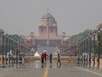 Heatwave in Delhi: Visitors take a walk on Kartavya Path as a mirage appears on a hot summer day, in New Delhi, Sunday, April 6, 2025. Heatwave in Delhi: Visitors take a walk on Kartavya Path as a mirage appears on a hot summer day, in New Delhi, Sunday, April 6, 2025.